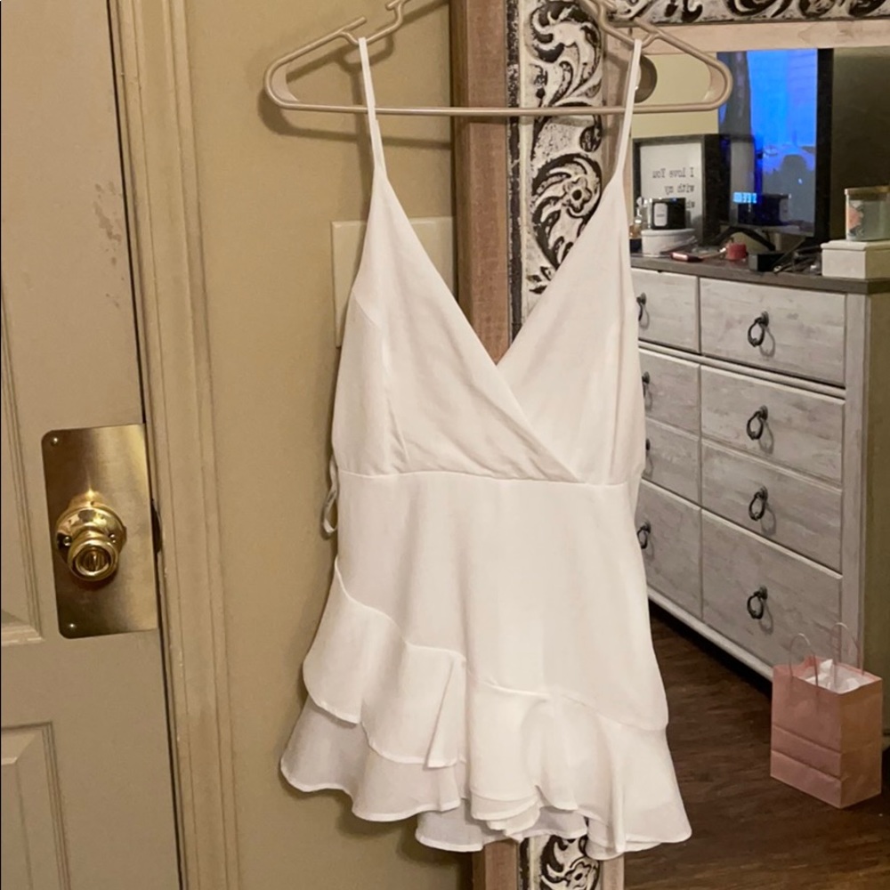 White romper with adjustable straps